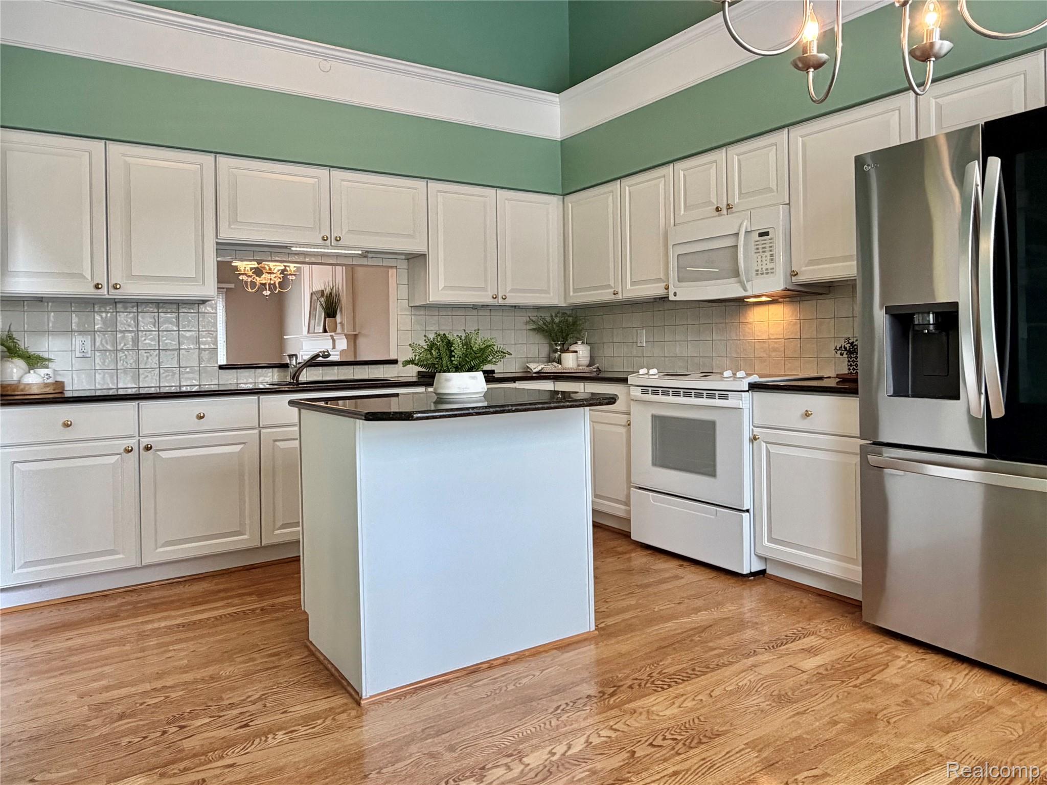1627 Boulder Court Rochester, MI 48306 - Photo 12 of 44 Center island, plenty of cabinet & counter space