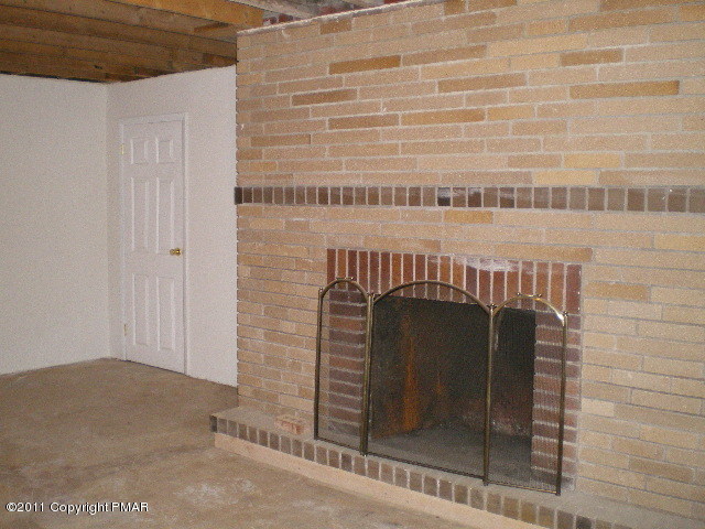 715 Deer Run Road Pocono Lake, PA 18347 - Photo 12 of 20 a close view of a fireplace