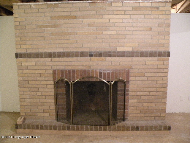 715 Deer Run Road Pocono Lake, PA 18347 - Photo 14 of 20 a close view of a fireplace