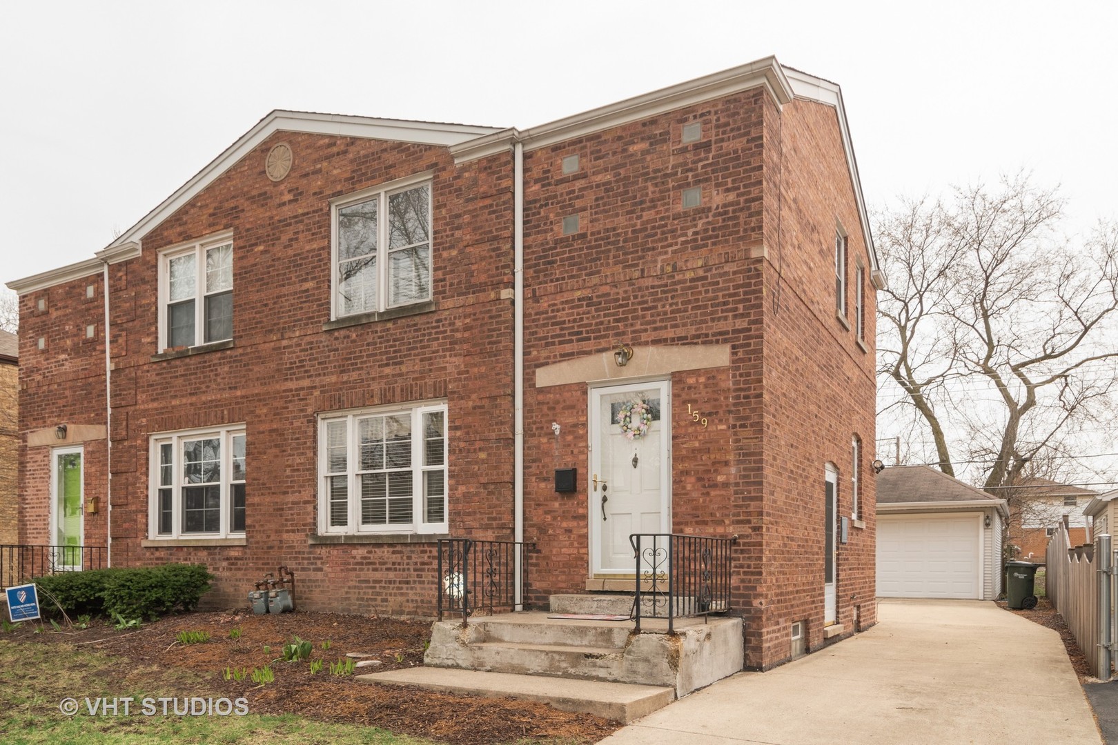 159 East Burlington Street Riverside, IL 60546 - Photo 1 of 19 a front view of a house with street