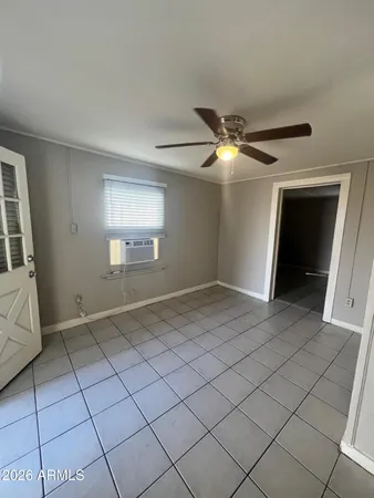 a view of an empty room and window