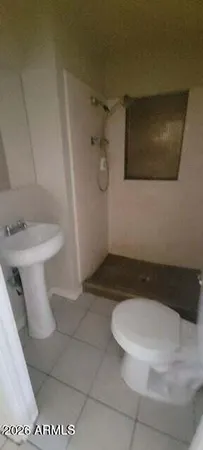 a view of a house with a yard and garage