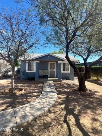 a view of house with outdoor space and street view