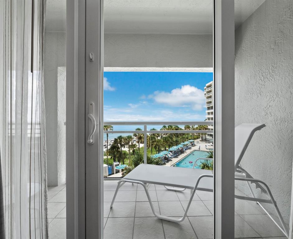 210 Sands Point Road, Unit 2405 Longboat Key, FL 34228 - Photo 22 of 36 a view of a glass door