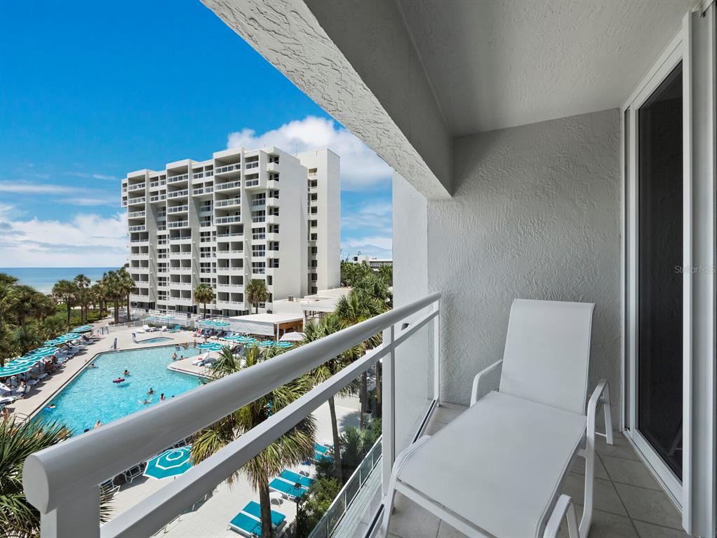 210 Sands Point Road, Unit 2405 Longboat Key, FL 34228 - Photo 23 of 36 a view of balcony with furniture