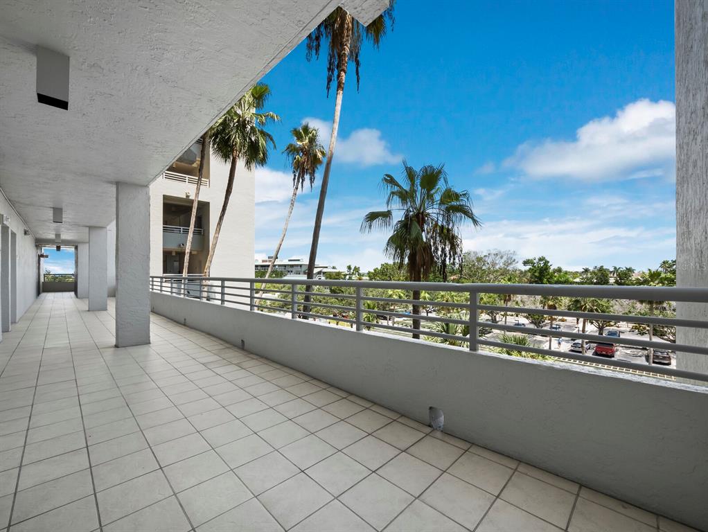 210 Sands Point Road, Unit 2405 Longboat Key, FL 34228 - Photo 3 of 36 a view of balcony with furniture