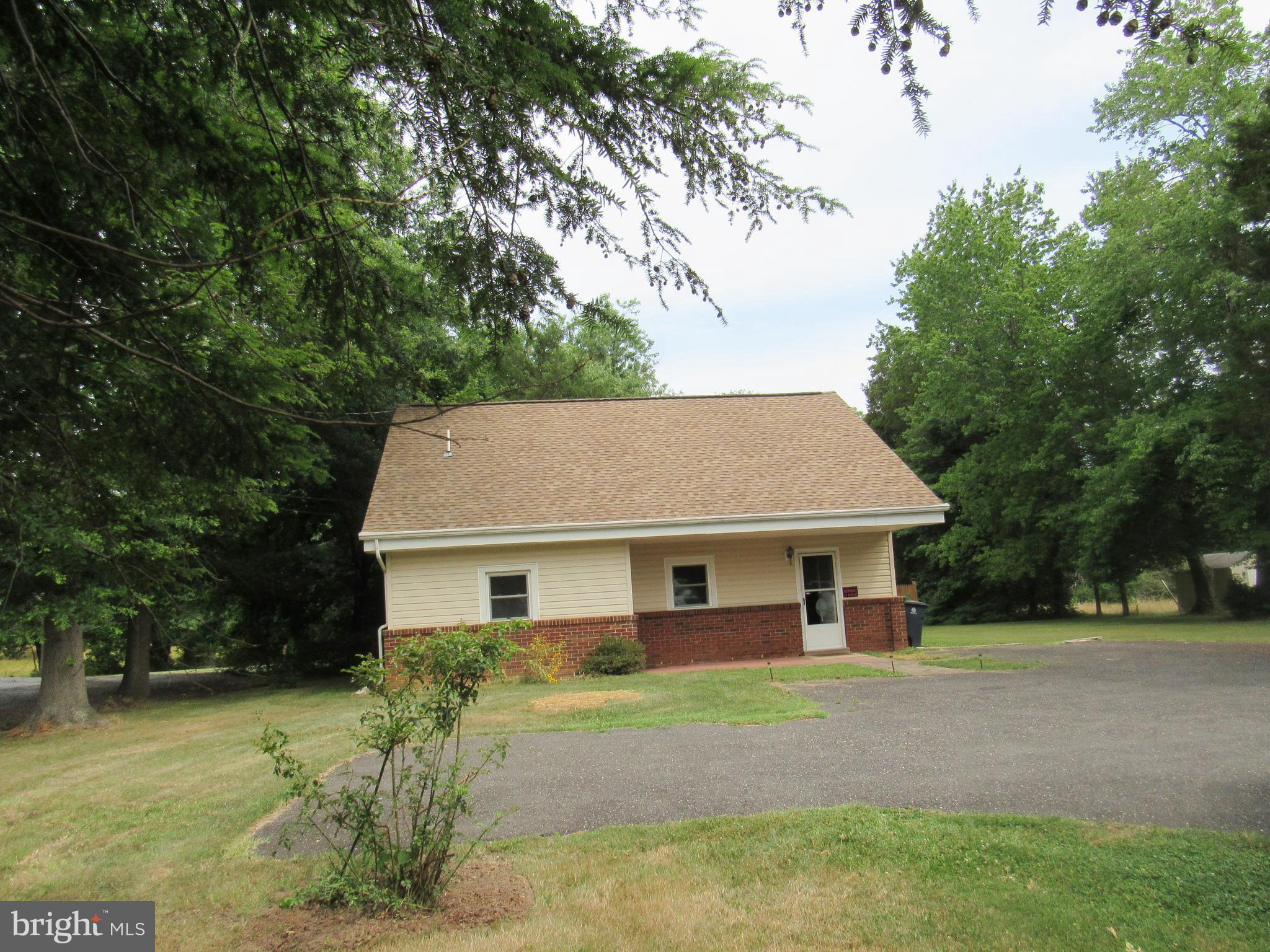 15619 Livingston Road Accokeek, MD 20607 - Photo 1 of 18 a view of a house with a yard