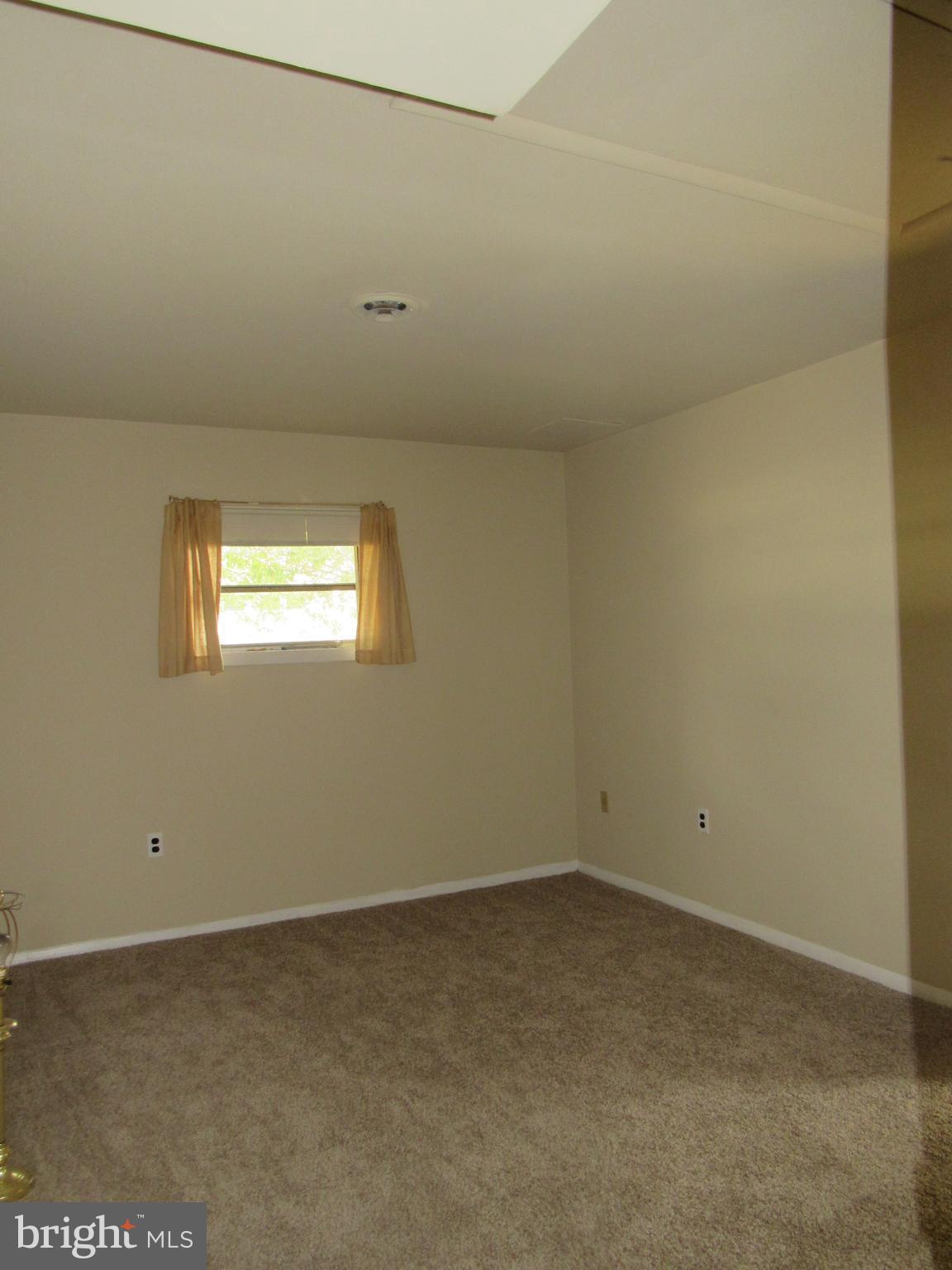 15619 Livingston Road Accokeek, MD 20607 - Photo 6 of 18 an empty room with a window