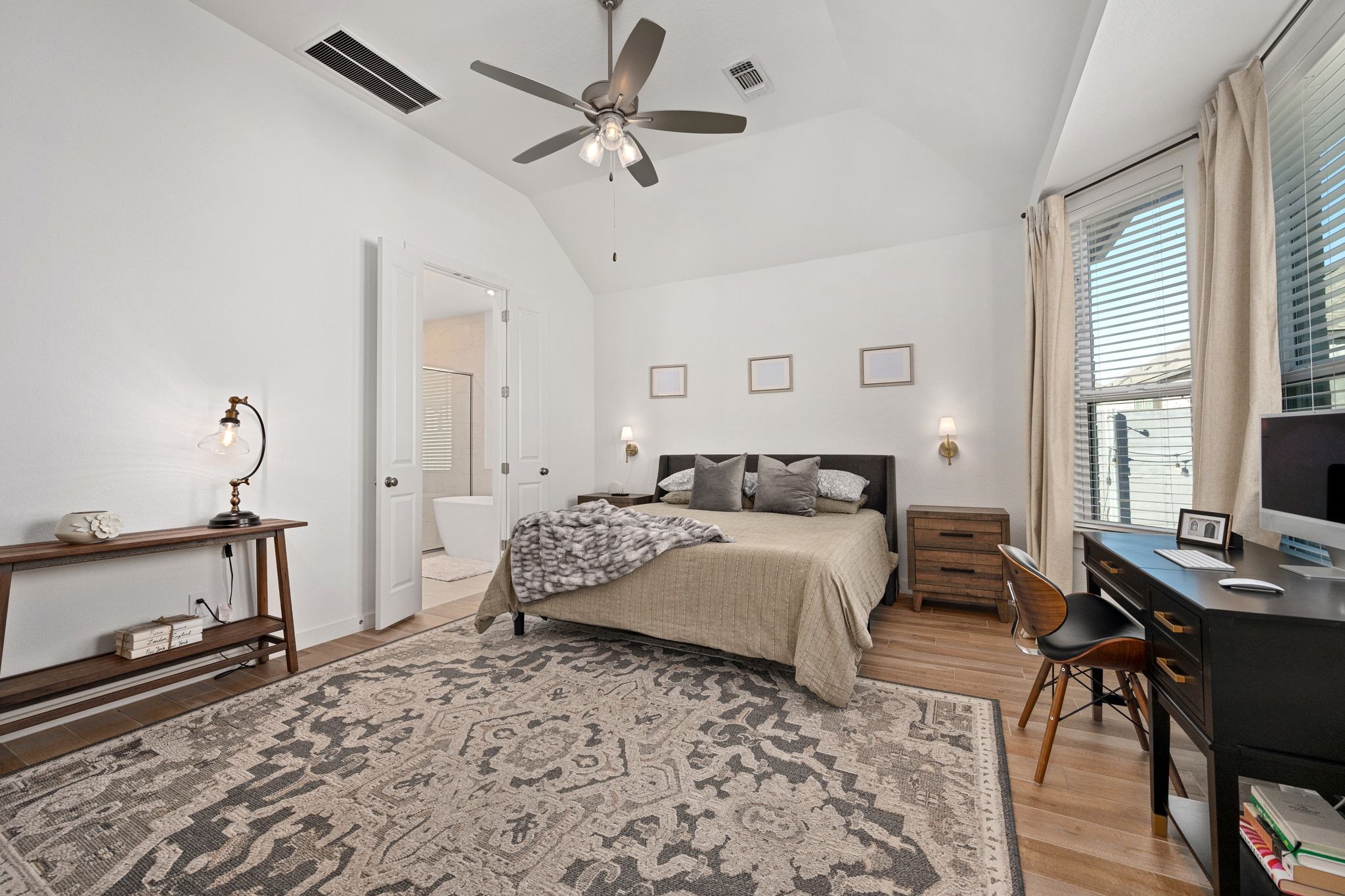 1201 Highcrest Georgetown, TX 78628 - Photo 22 of 40 a bedroom with a bed and a chandelier