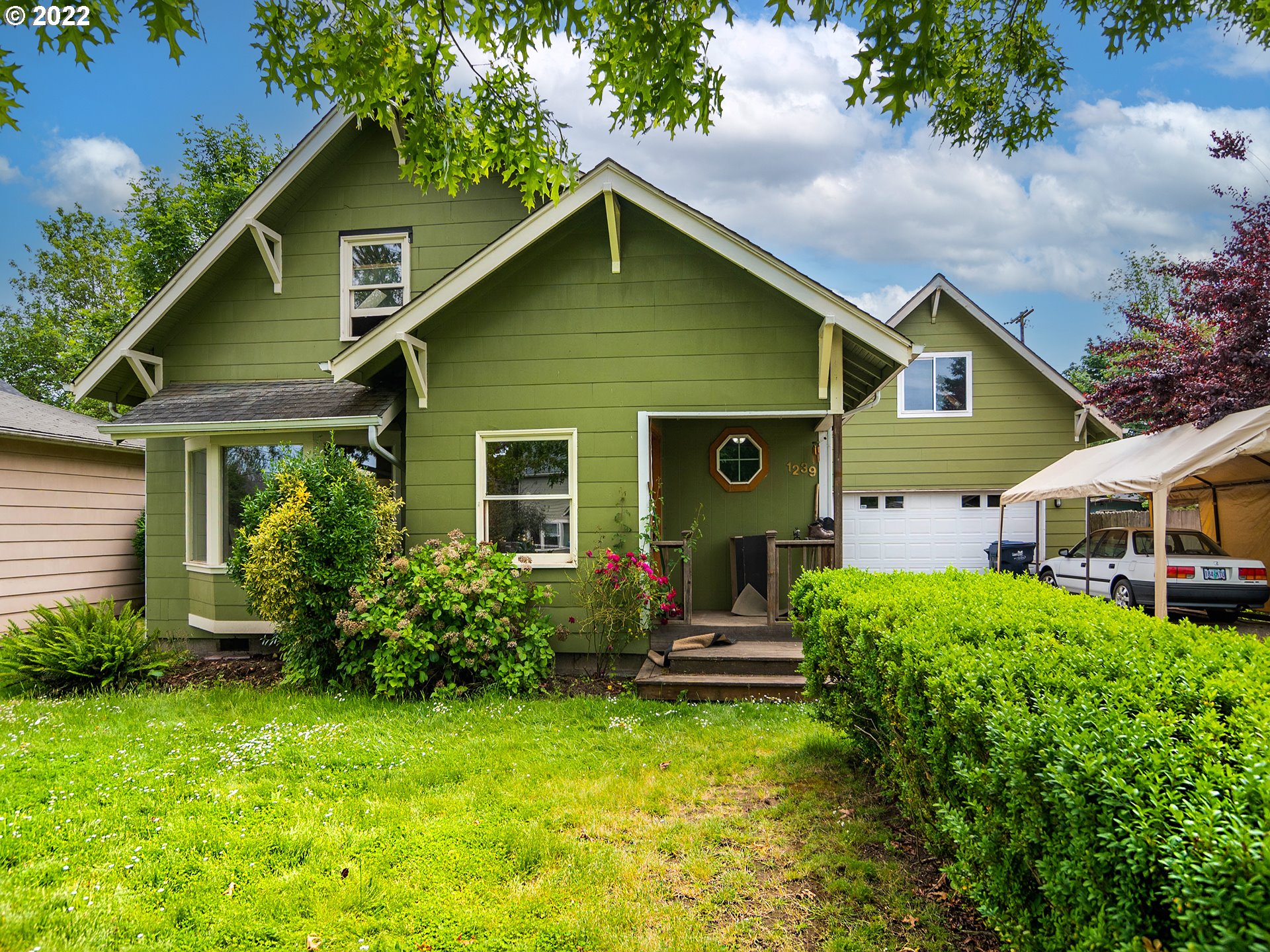 1239 D Street Springfield, OR 97477 - Photo 1 of 32 a front view of house with yard and green space