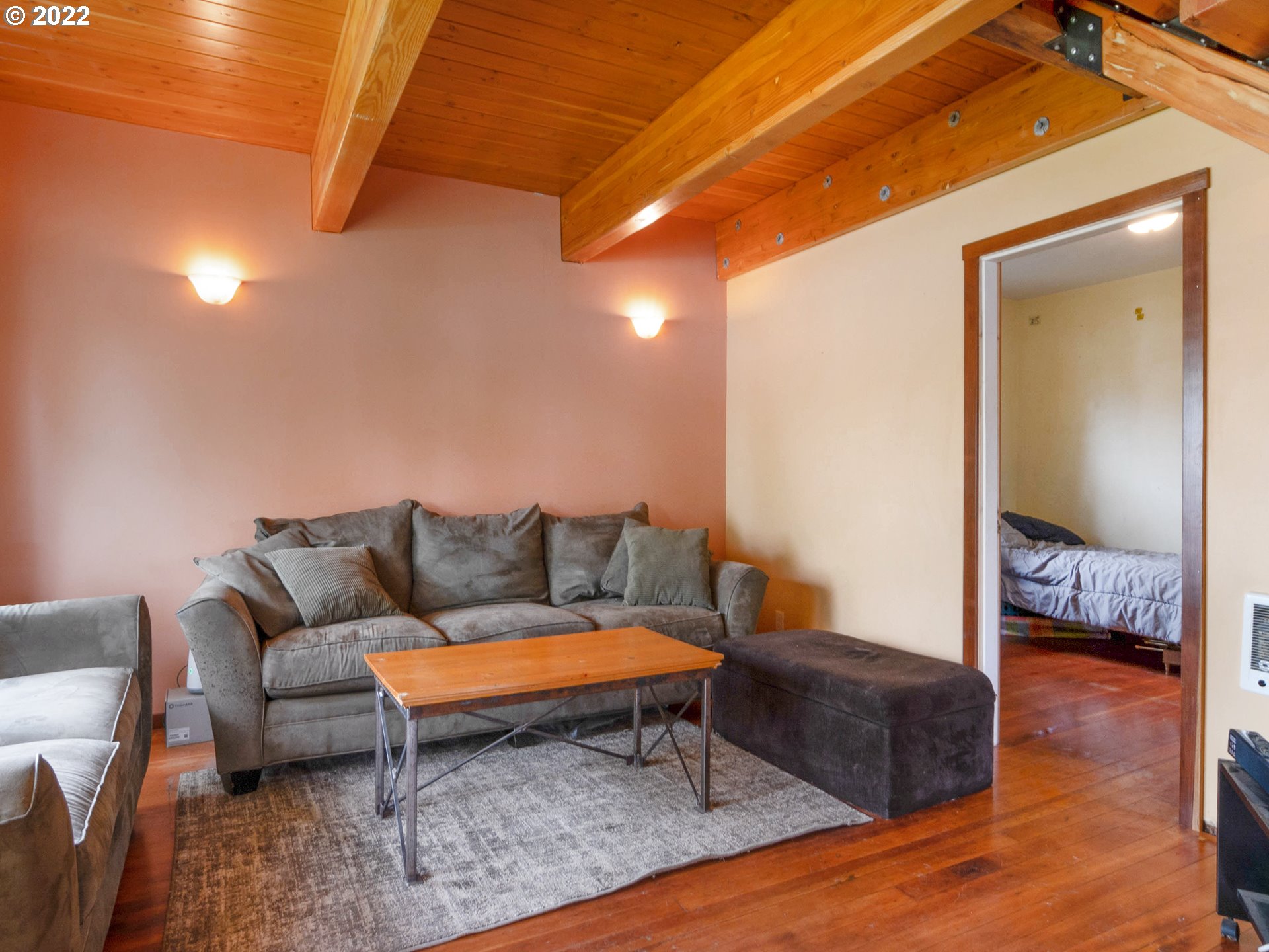 1239 D Street Springfield, OR 97477 - Photo 12 of 32 a living room with furniture and a wooden floor