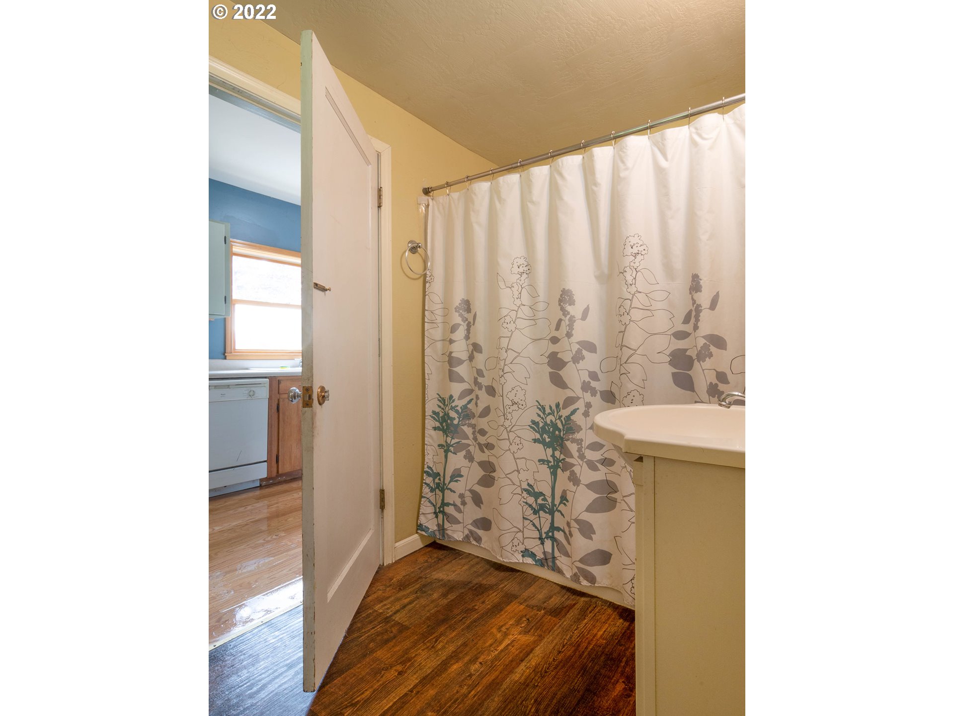 1239 D Street Springfield, OR 97477 - Photo 15 of 32 a view of entryway with wooden floor