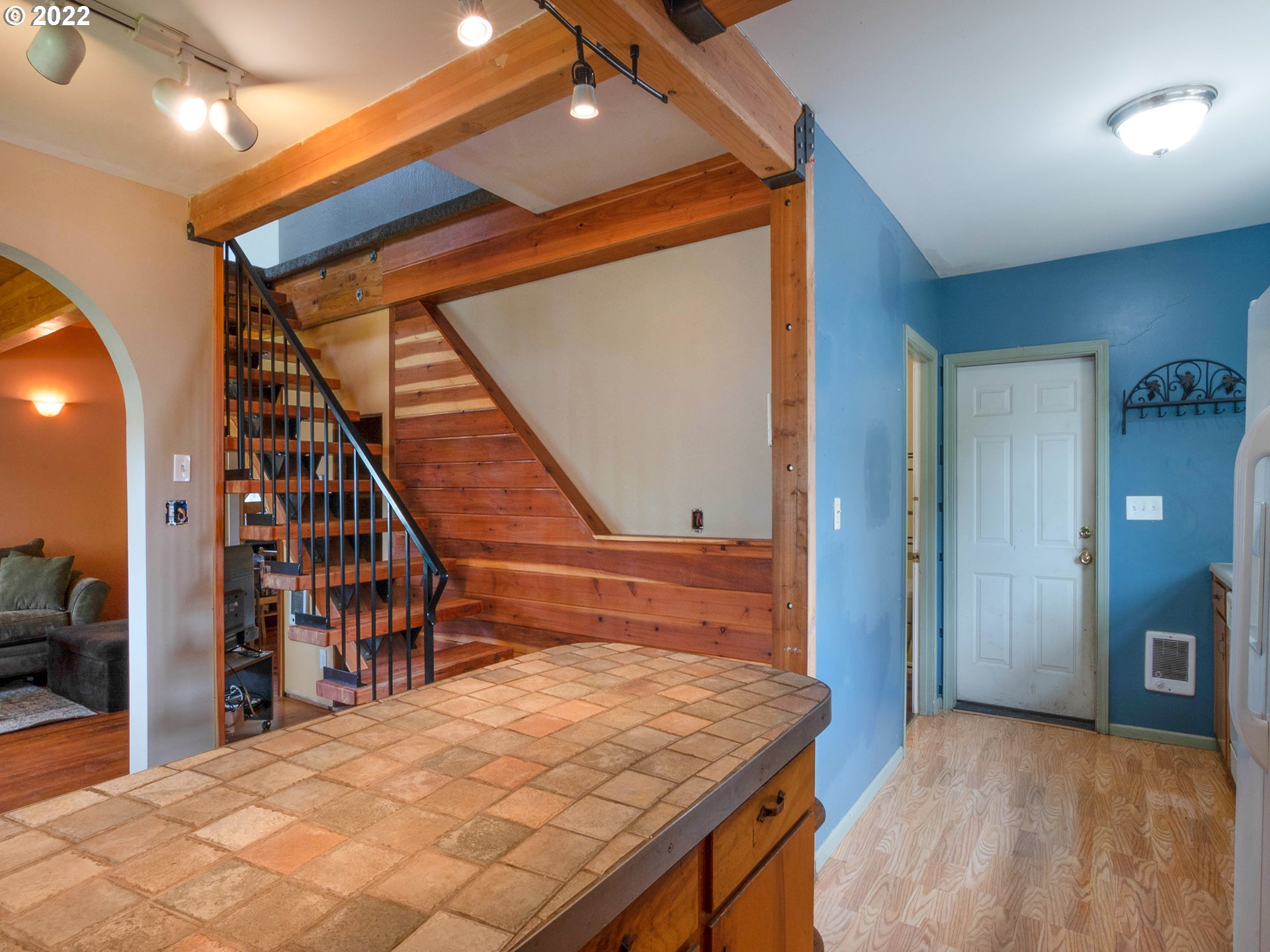 1239 D Street Springfield, OR 97477 - Photo 9 of 32 a bedroom with a bed and a table in it