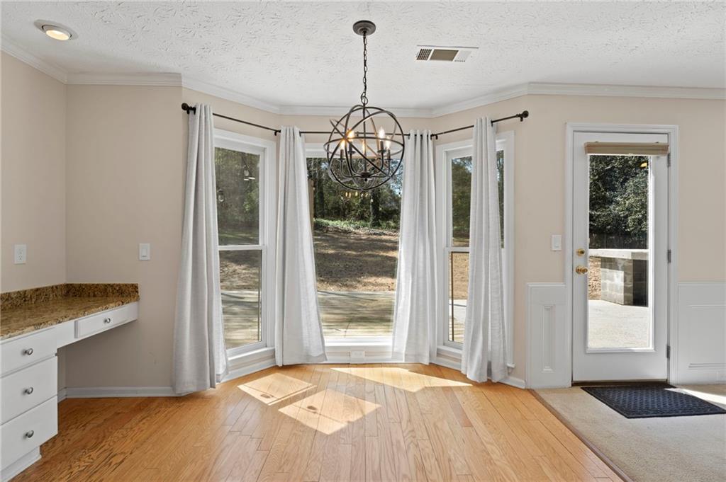 1381 Gateswalk Path Lawrenceville, GA 30045 - Photo 16 of 45 a bedroom with a bed and a window