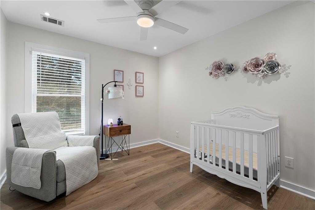 1381 Gateswalk Path Lawrenceville, GA 30045 - Photo 26 of 45 a bedroom with furniture and window