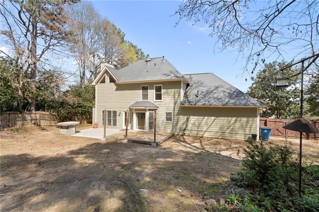 1381 Gateswalk Path Lawrenceville, GA 30045 - Photo 43 of 45 a front view of a house with a yard