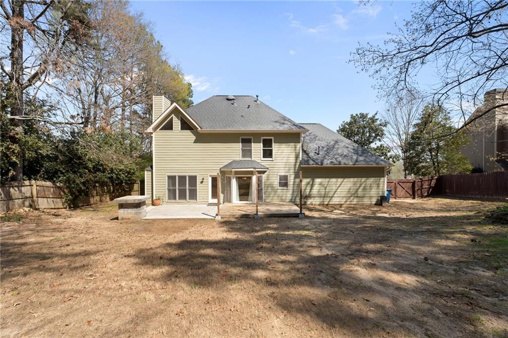 1381 Gateswalk Path Lawrenceville, GA 30045 - Photo 44 of 45 a front view of a house with a yard
