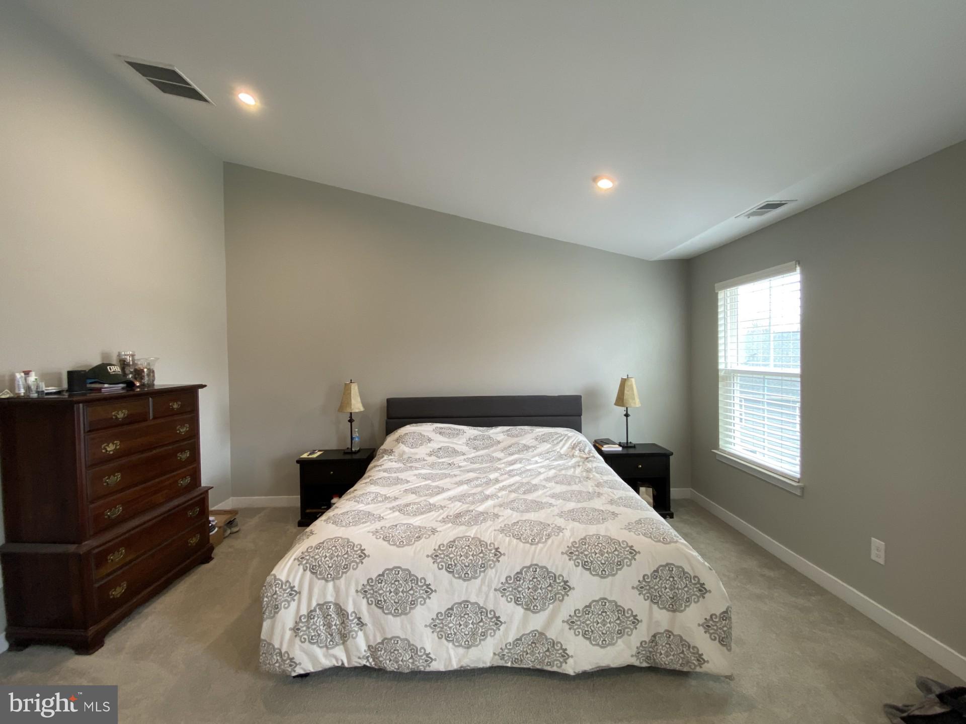 1214 Benjamin Drive Kennett Square, PA 19348 - Photo 11 of 34 a bedroom with a bed and a window