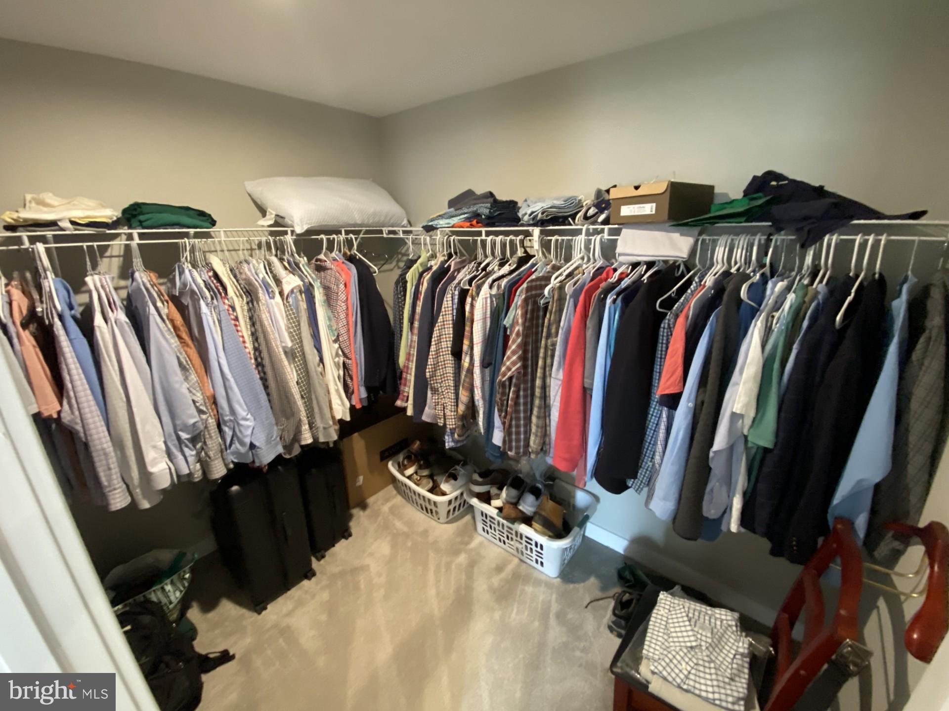 1214 Benjamin Drive Kennett Square, PA 19348 - Photo 14 of 34 a view of walk in closet with clothes and shoes
