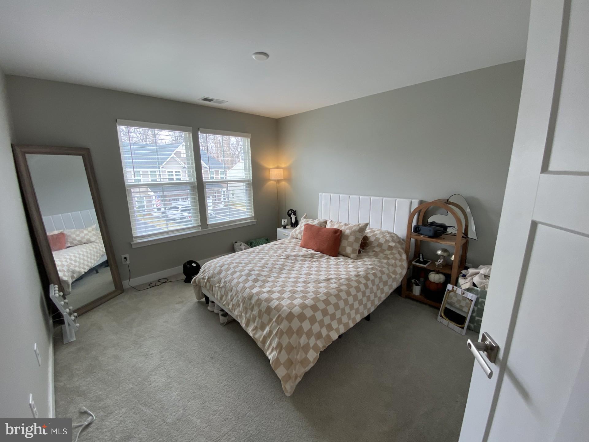 1214 Benjamin Drive Kennett Square, PA 19348 - Photo 17 of 34 a bedroom with a bed and a window