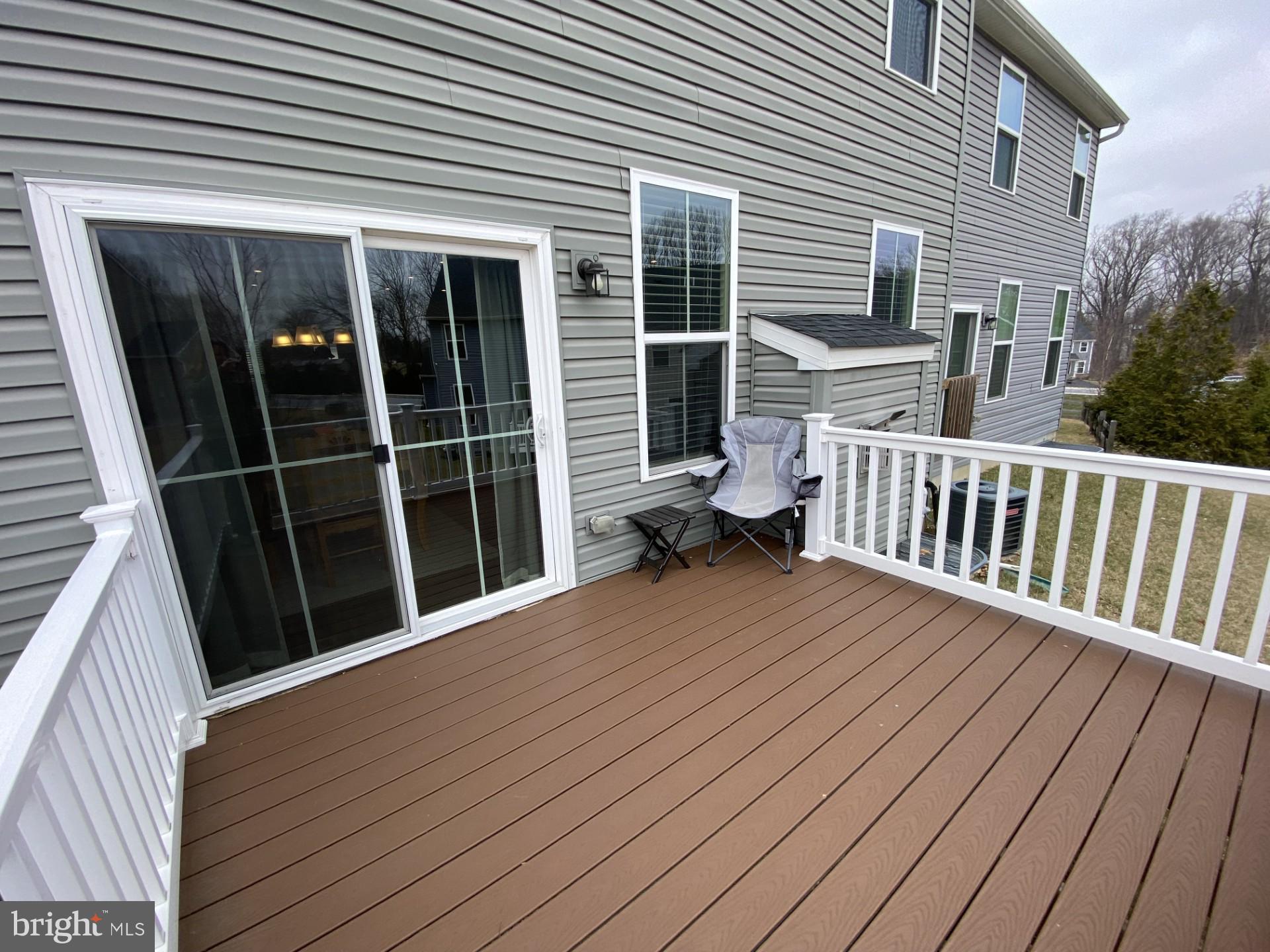 1214 Benjamin Drive Kennett Square, PA 19348 - Photo 24 of 34 a view of a deck with wooden floor and fence