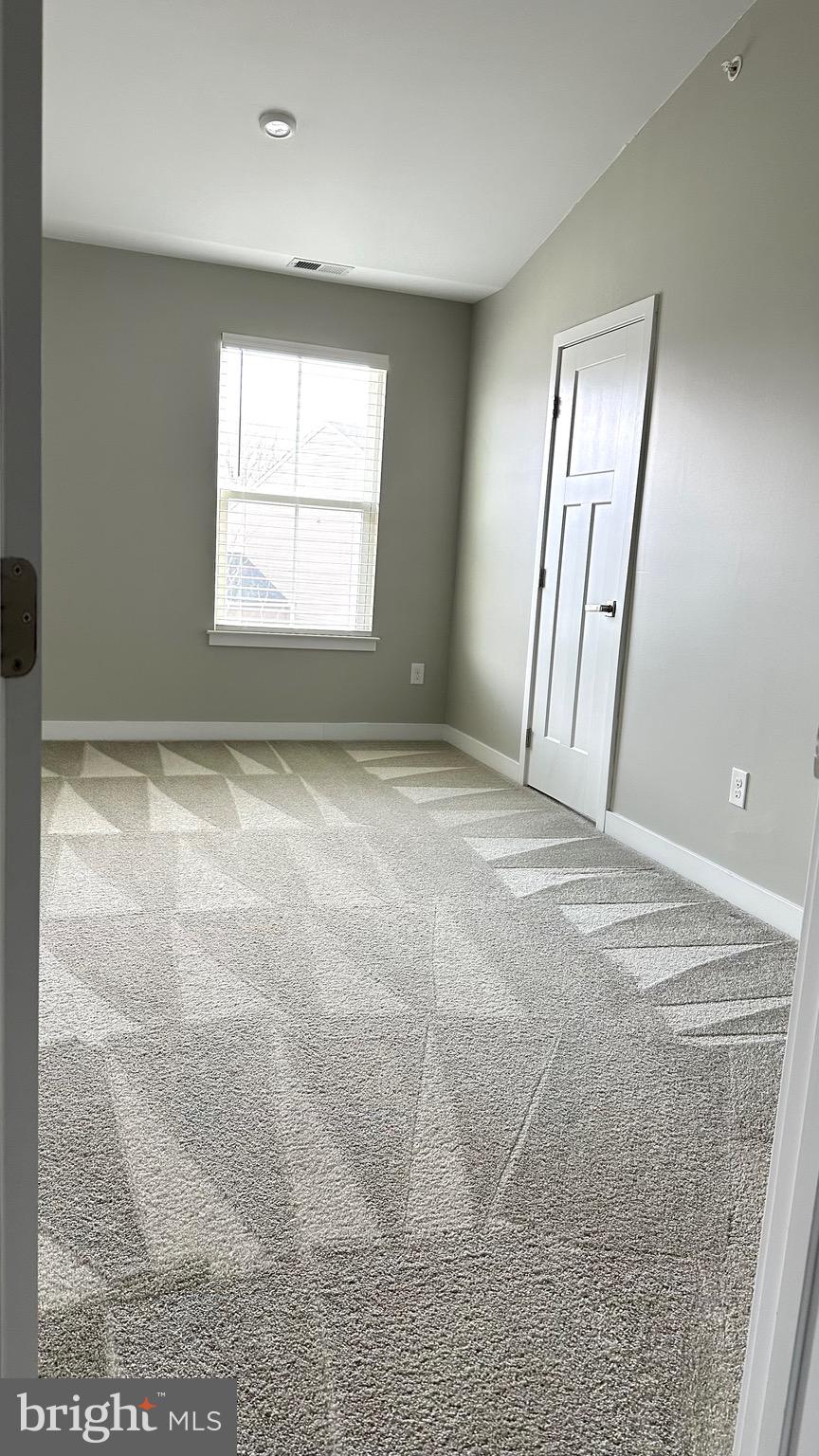 1214 Benjamin Drive Kennett Square, PA 19348 - Photo 31 of 34 a view of an empty room with a window
