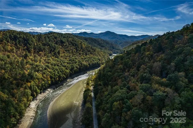 a view of a city with mountains in the background