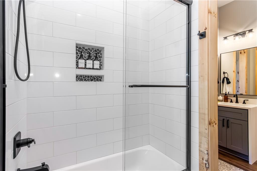 1272 Foxhound Trail Northeast Ranger, GA 30734 - Photo 41 of 69 a bathroom with a shower