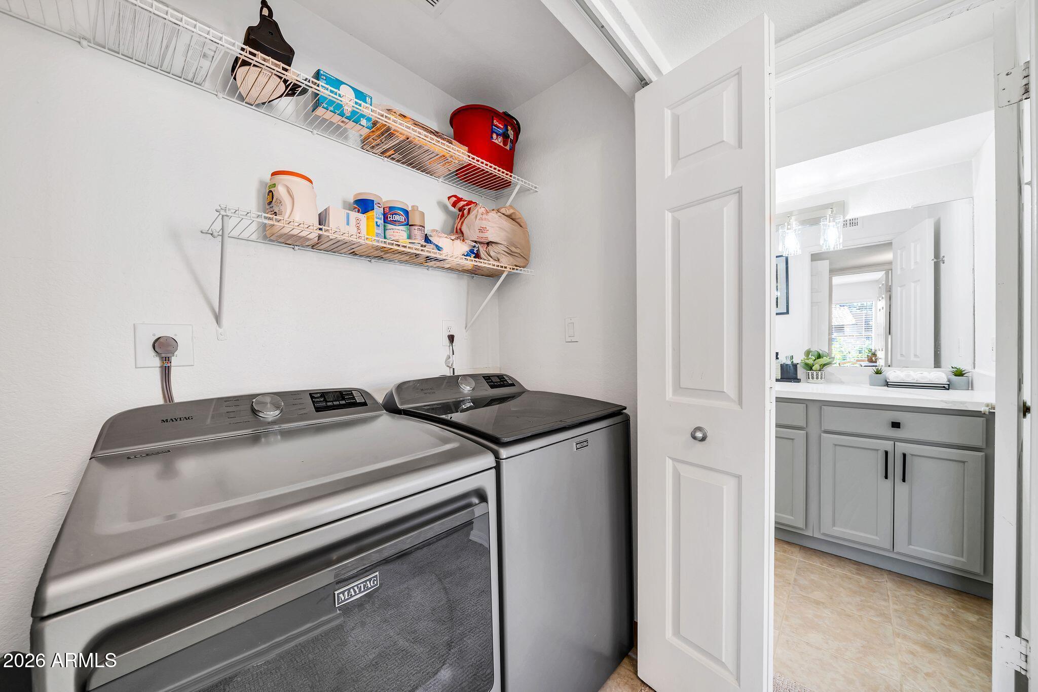 8787 East Mountain View Road, Unit 2038 Scottsdale, AZ 85258 - Photo 26 of 37 a utility room with sink dryer and washer