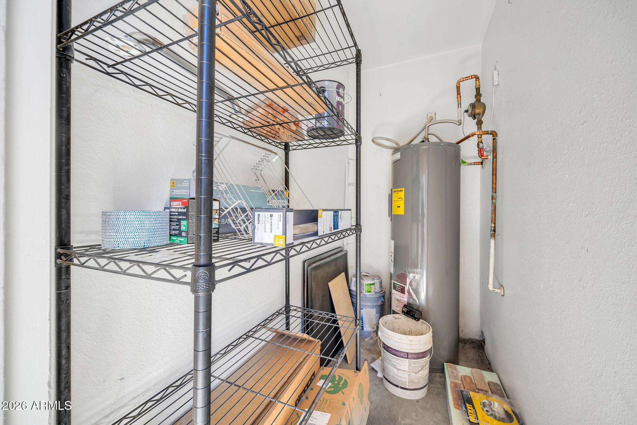 8787 East Mountain View Road, Unit 2038 Scottsdale, AZ 85258 - Photo 28 of 37 a bathroom with a granite countertop sink and a mirror