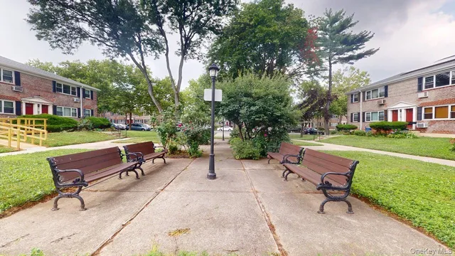 a view of a patio with a yard
