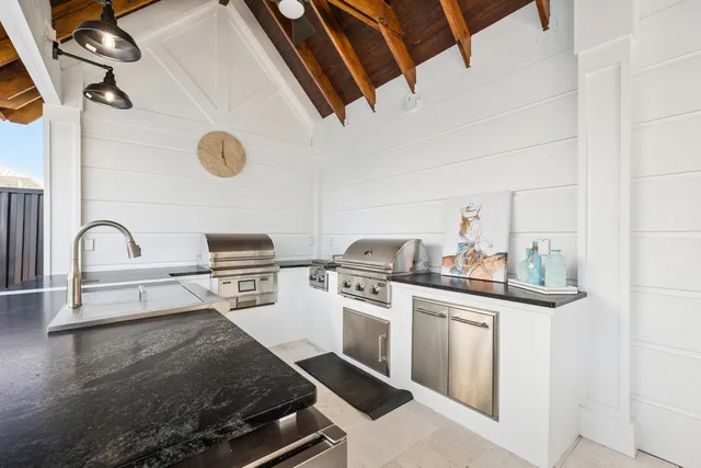 a bedroom with a bed and a table