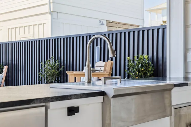 a bathroom with a double vanity sink mirror and toilet