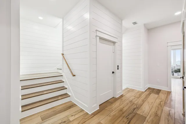 a bed room with a bed and a window