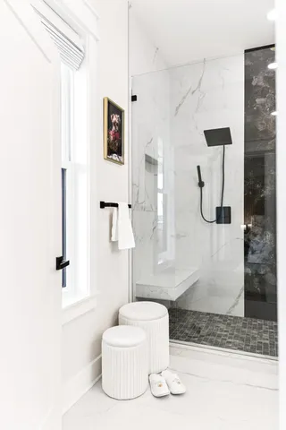 a view of a living room with a large window