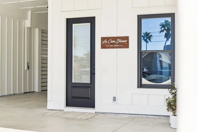 a view of outdoor space and deck having patio