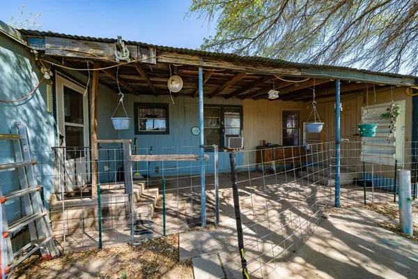 a bed room with a bed and a dresser