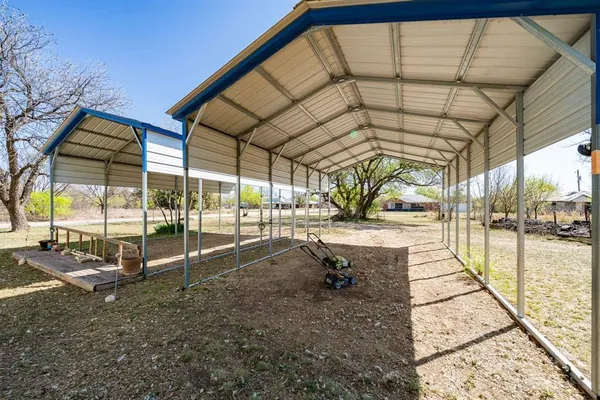 a view of swimming pool with a patio