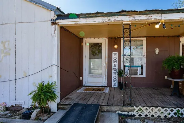 a view of a house with a porch