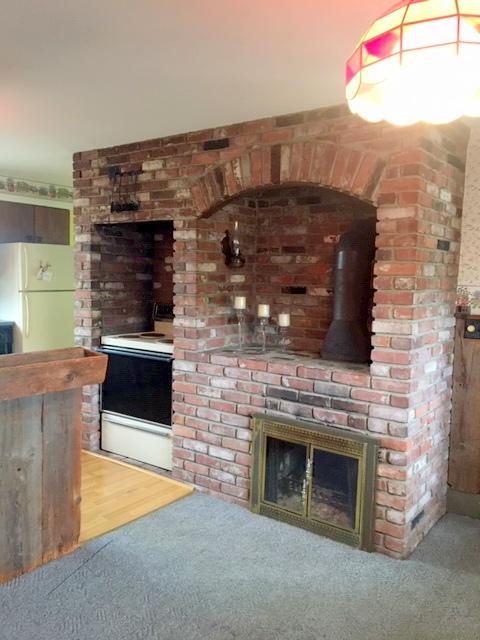 263 South Reynolds Road Winslow, ME 04901 - Photo 8 of 29 Kitchen fireplace