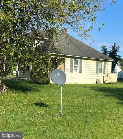 a house view with a garden space