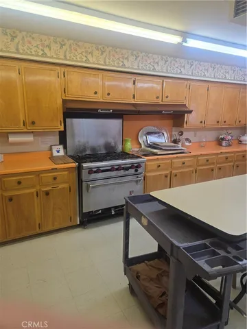 a room with lots of furniture and a mirror