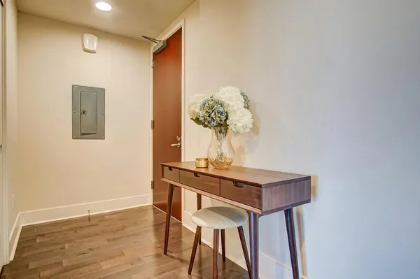 a view of a workspace with furniture