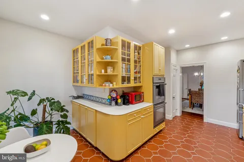 a very nice looking room with kitchen