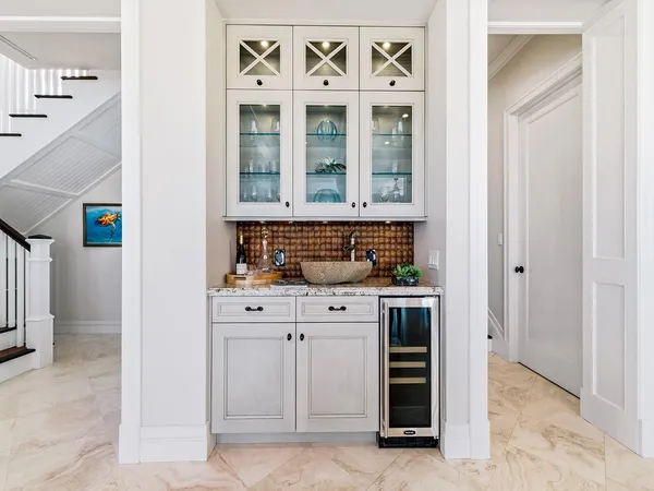 a view of kitchen with stainless steel appliances granite countertop and a stove top oven