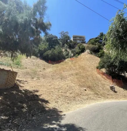 a view of a road with a yard