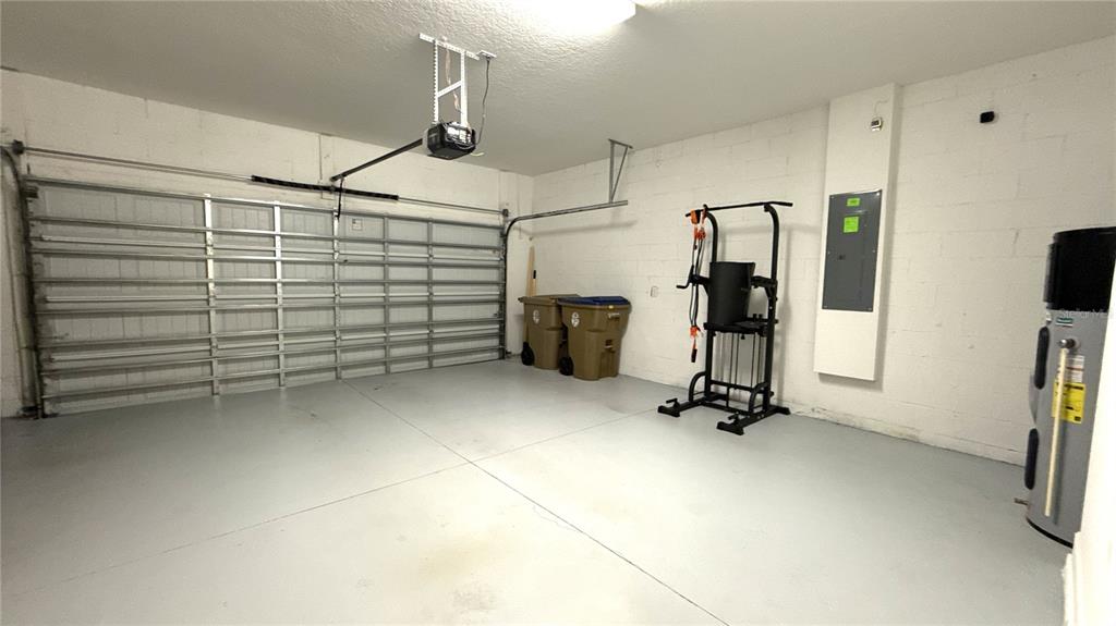 1055 Blackwolf Run Road Davenport, FL 33896 - Photo 13 of 23 a view of a room with gym equipment