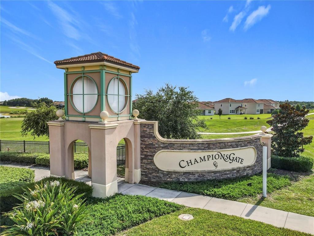 1055 Blackwolf Run Road Davenport, FL 33896 - Photo 16 of 23 a front view of a house with garden