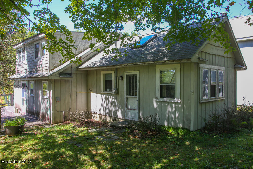 147 Sumner Stetson Road Heath, MA 01339 - Photo 26 of 37 a front view of a house with a yard