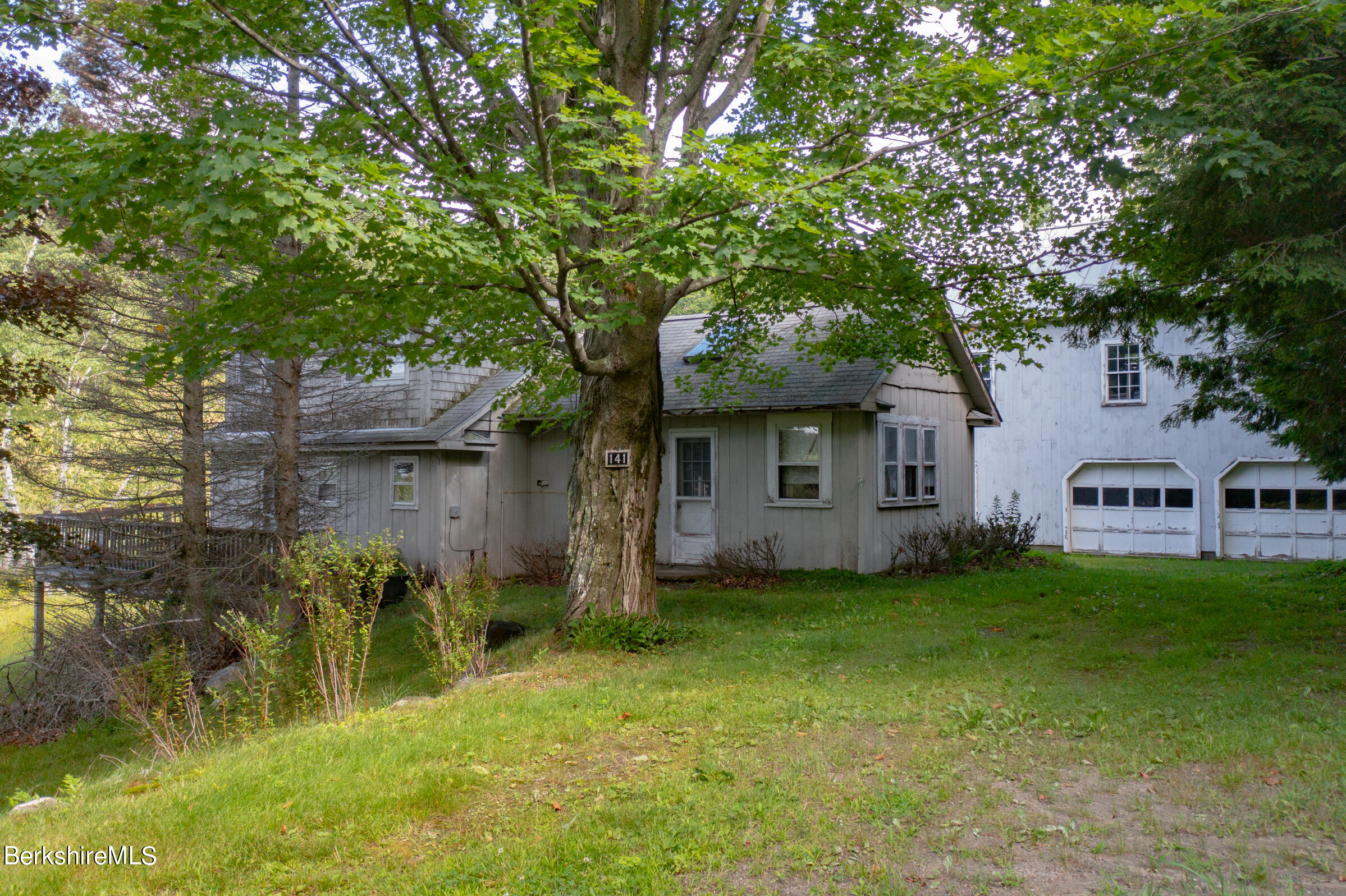 147 Sumner Stetson Road Heath, MA 01339 - Photo 27 of 37 a front view of a house with a garden